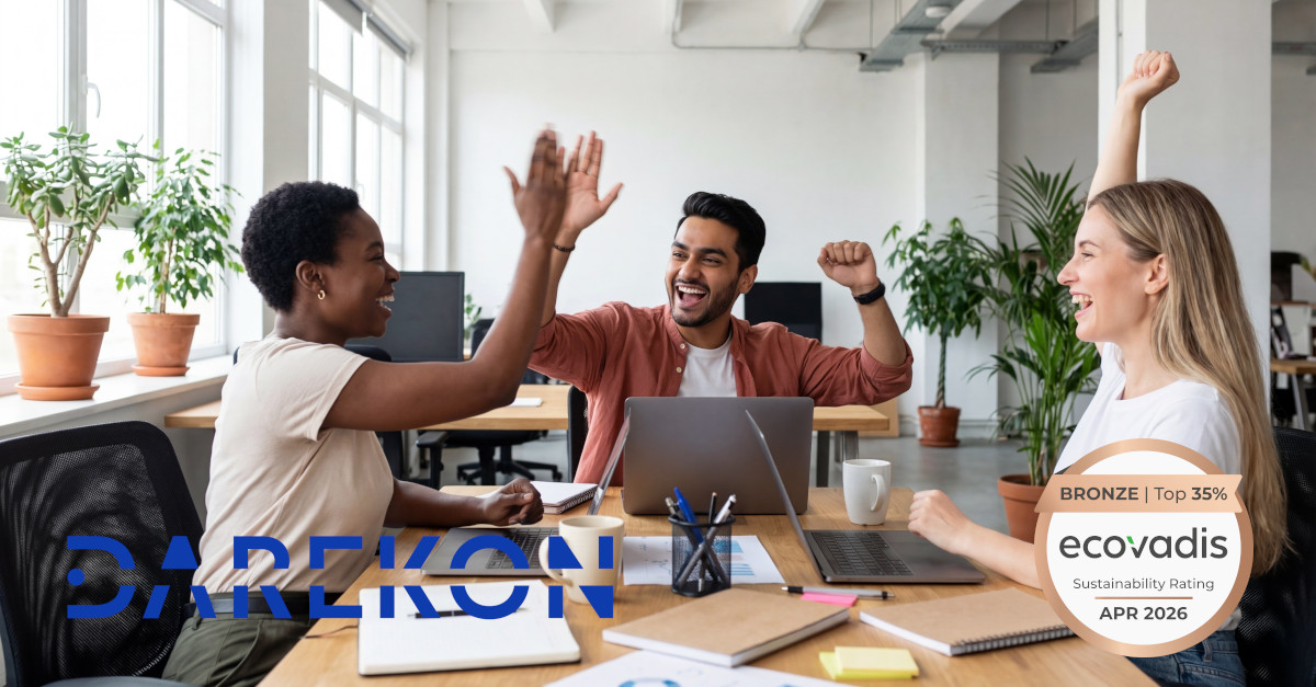 People celebrating in an office, Darekon logo and EcoVadis bronze medal added